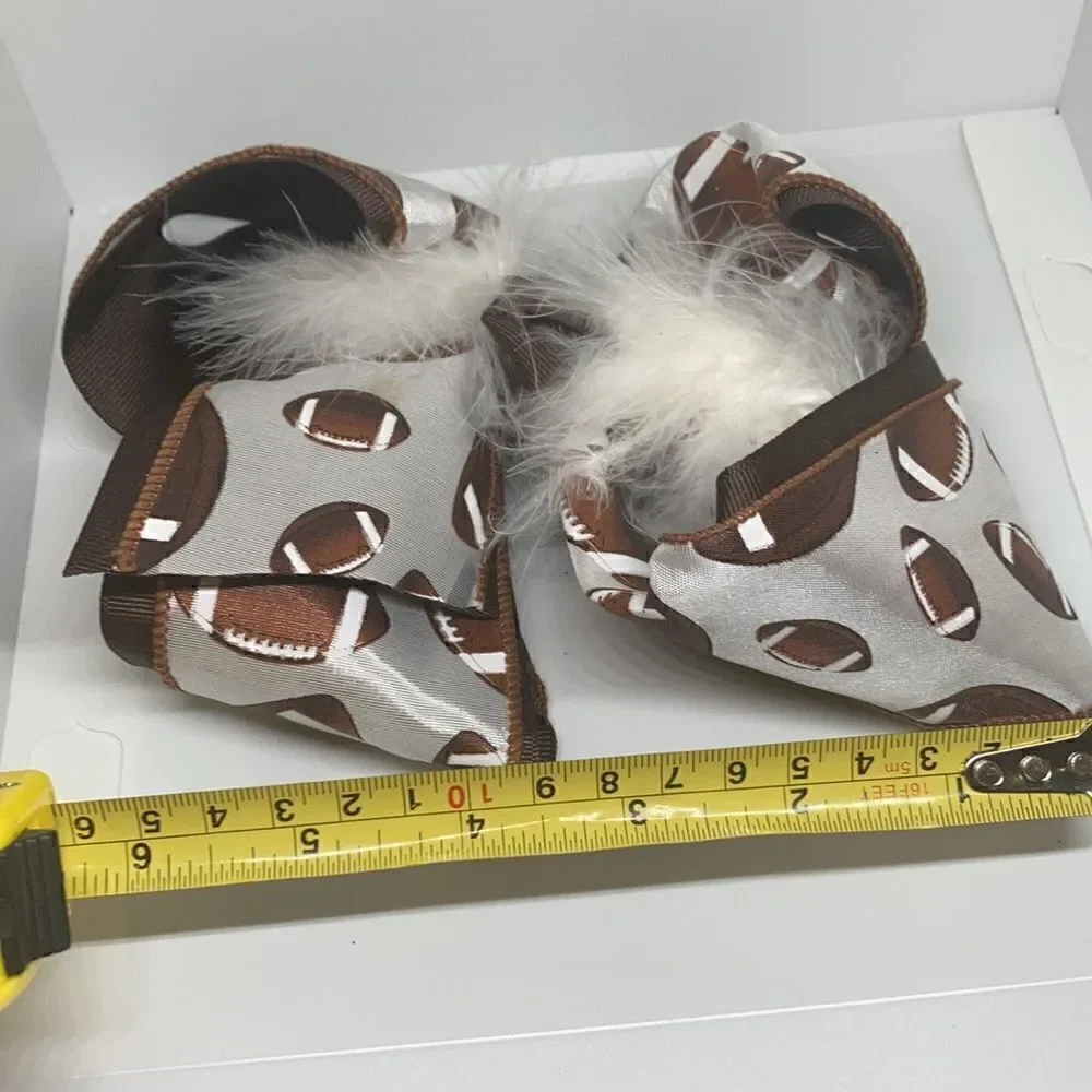 Girls large football hair bow